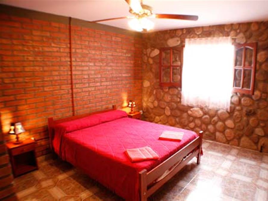 Dormitorio matrimonial de cabañas Nº 1 Y 2 para 7 personas | Santa Rita Cabañas - Mina Clavero - Traslasierra