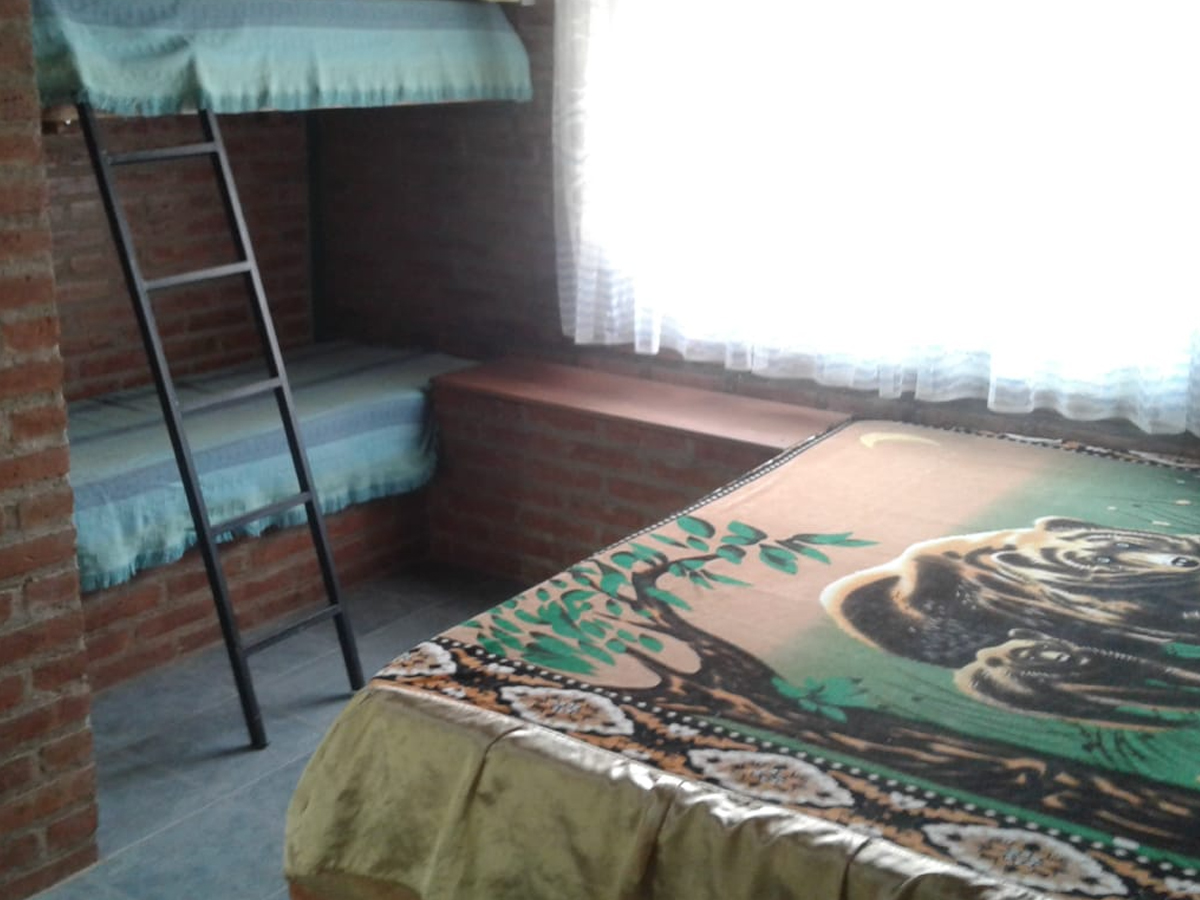 Dormitorio matrimonial con cucheta | La Casa del Abdon - Nono - Traslasierra