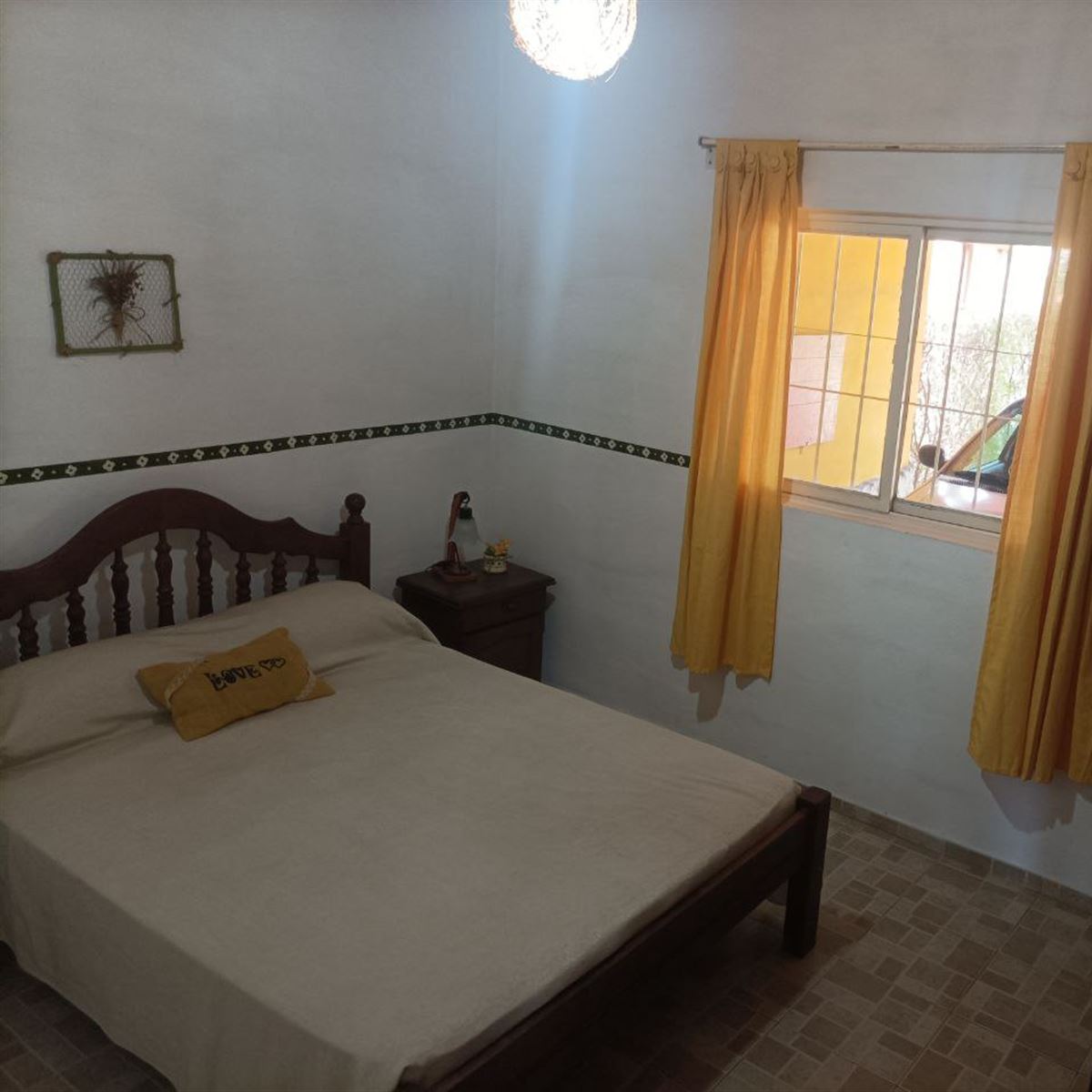 Habitación matrimonial de la cabaña amarilla para 6 personas | Cabañas El Tacu - Nono - Traslasierra