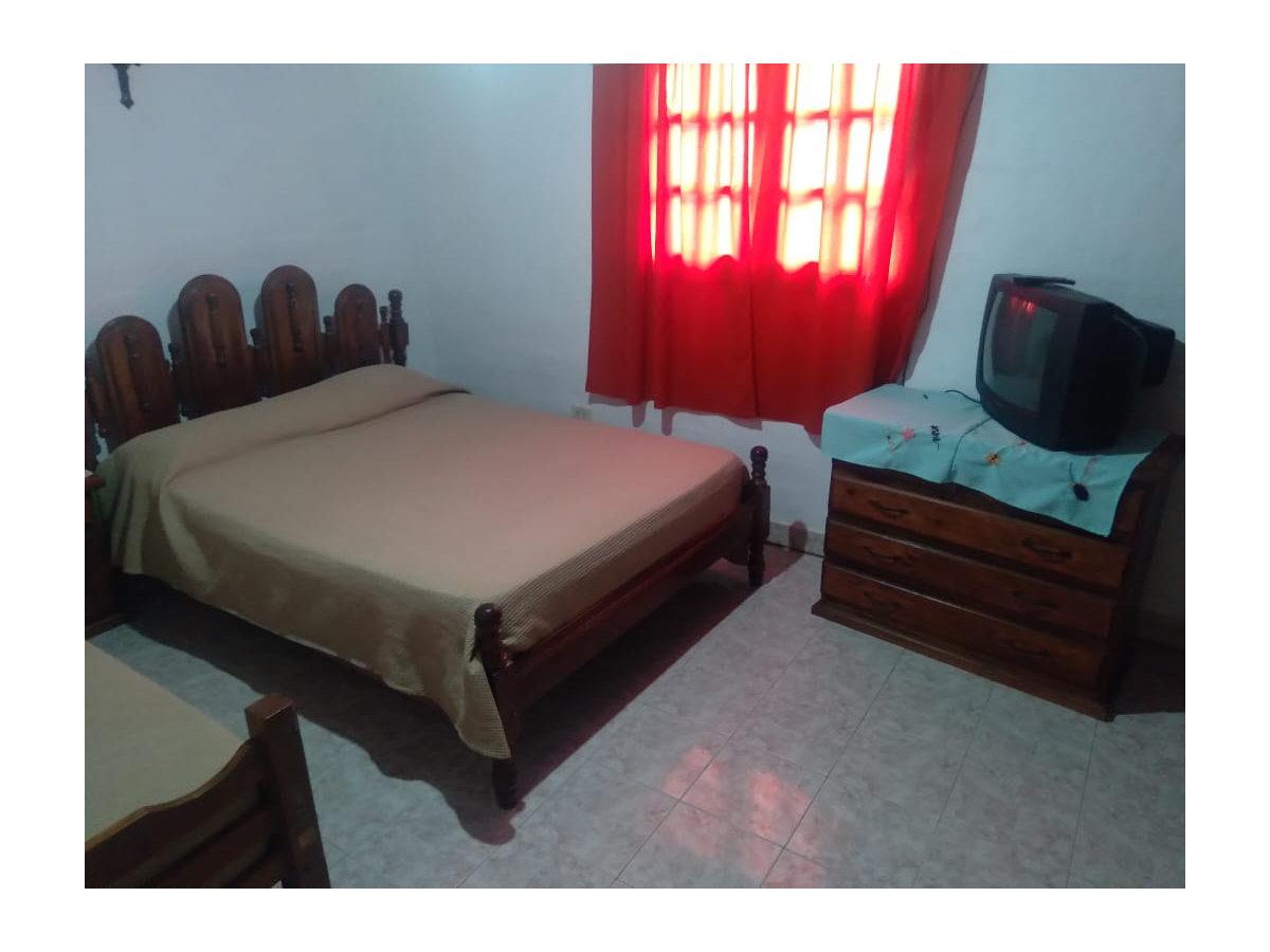 Dormitorio matrimonial y cama simple | El Paraíso Casa - Mina Clavero - Traslasierra