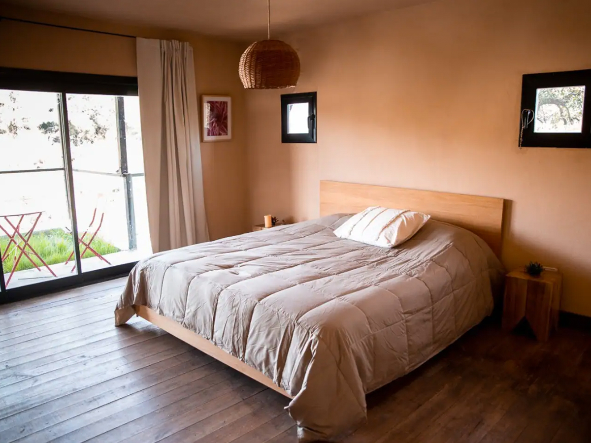 Dormitorio en suite | Casa Cueva a orilla del río a 50km de Mina Clavero - Taninga - Traslasierra